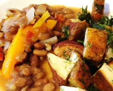 Pinto beans and yellow and orange bell peppers with capers and mustard; roasted red and russet potatoes with collards and dill